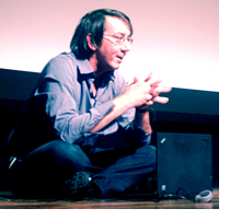 Will Wright, video game developer extraordinaire, takes questions from the audience while sitting on stage